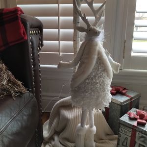 Reindeer in white dress, boots, cape. 32" high